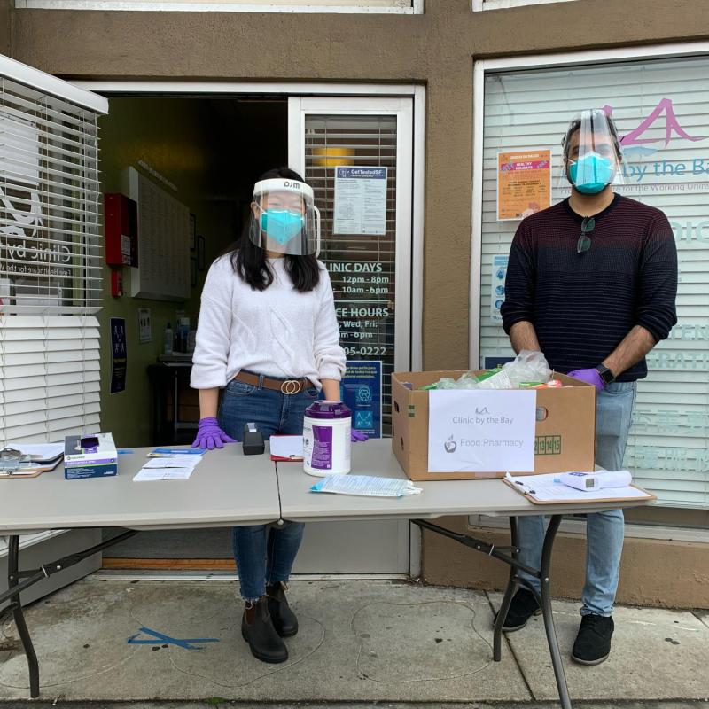 Cindy Won (left) serving at Clinic by the Bay's Food Pharmacy. 