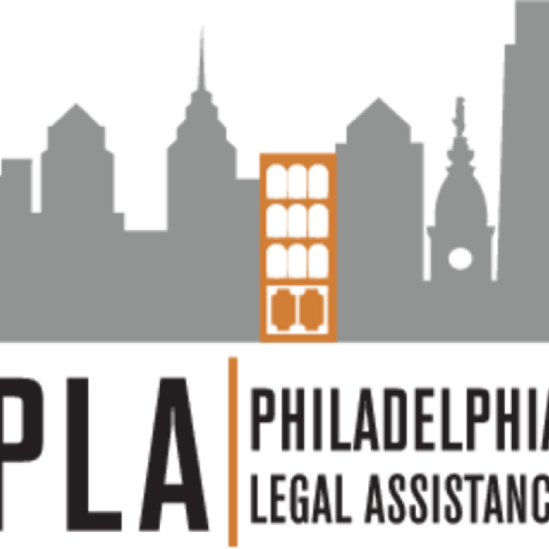 Philadelphia Legal Assistance logo featuring a gray silhouette skyline with an orange building in the middle. Text reads PLA: Philadelphia Legal Assistance