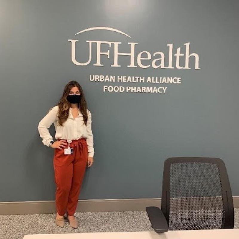 NHC Member Taylor serving in the new Food Pharmacy at the TCC.