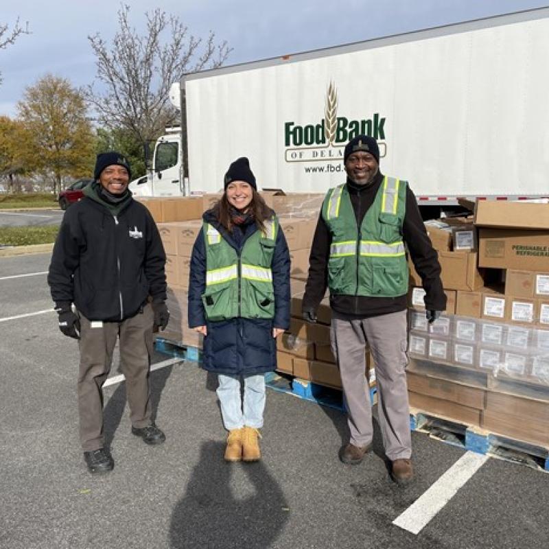 (From left to right: Lanier Williams [Food Bank of Delaware Driver] Penelope Velasco [NHC Member], and Alfred Mapp, [longtime loyal Food Bank of Delaware volunteer]
