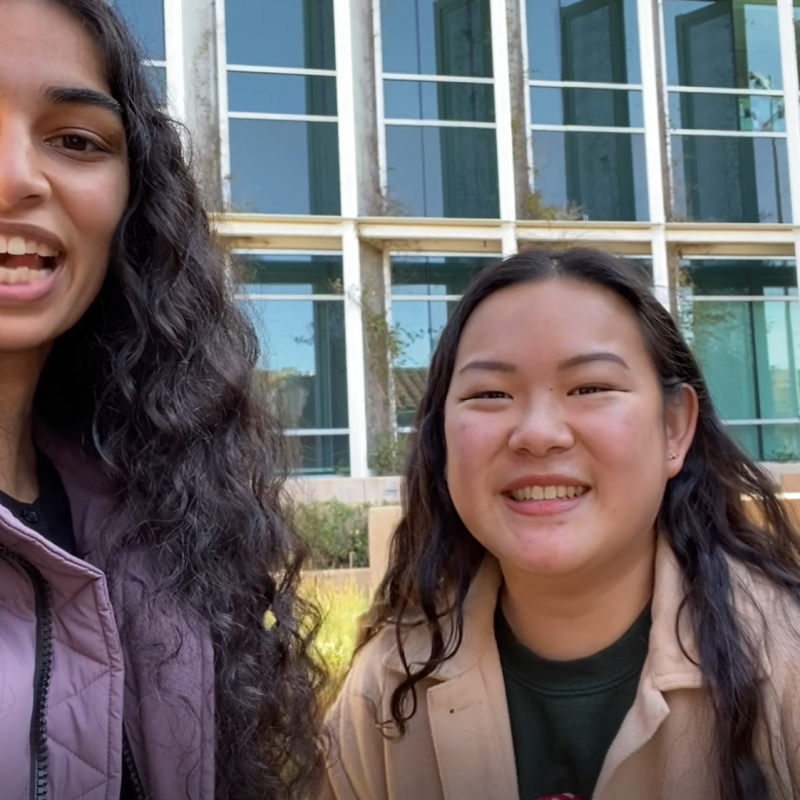 Anita and Cynthia are seen facing the camera smiling. 