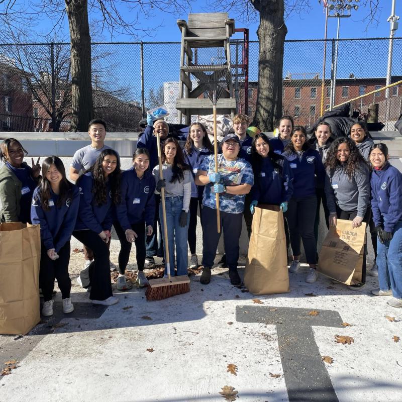 a group photo of NHC members volunteering at a local rec center