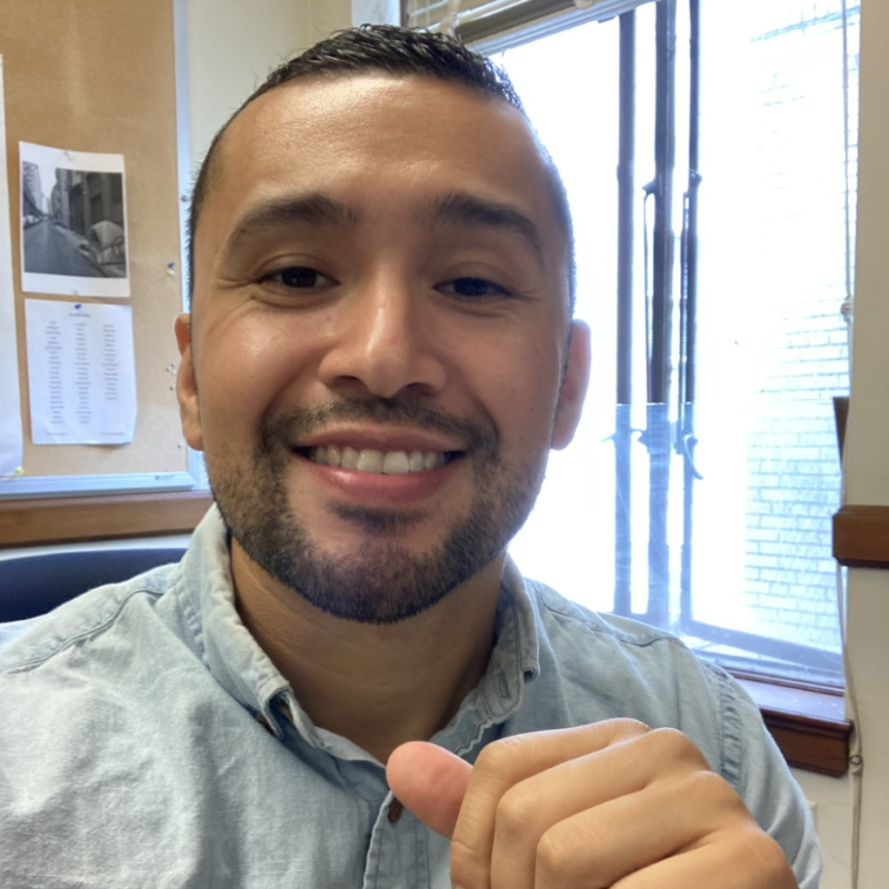 Jessie Escobar smiling at the camera. 