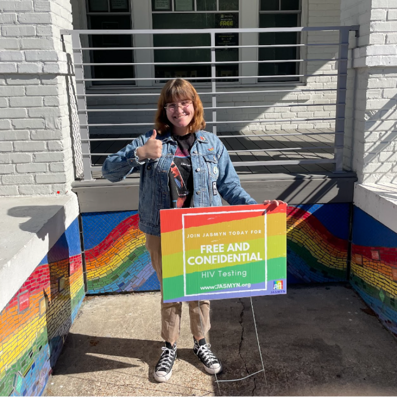 Pictured is Beth Anne conducting outreach for JASMYN 