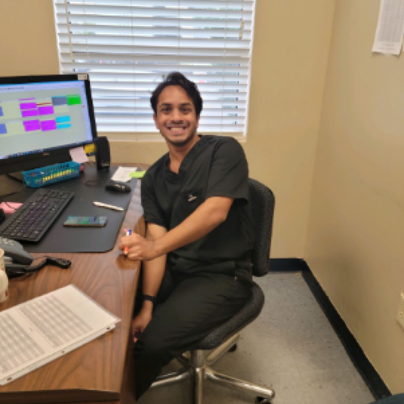 Pictured is Rehan Subramanyam performing eligibility screenings. 