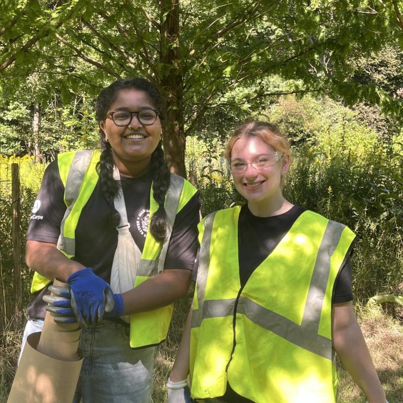 Aparna (left) and Elizabeth (right) pose together during an NHC Pittsburgh Service Day Event.