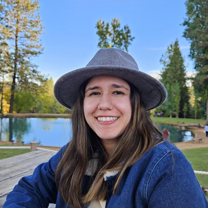 Abby's Headshot in nature